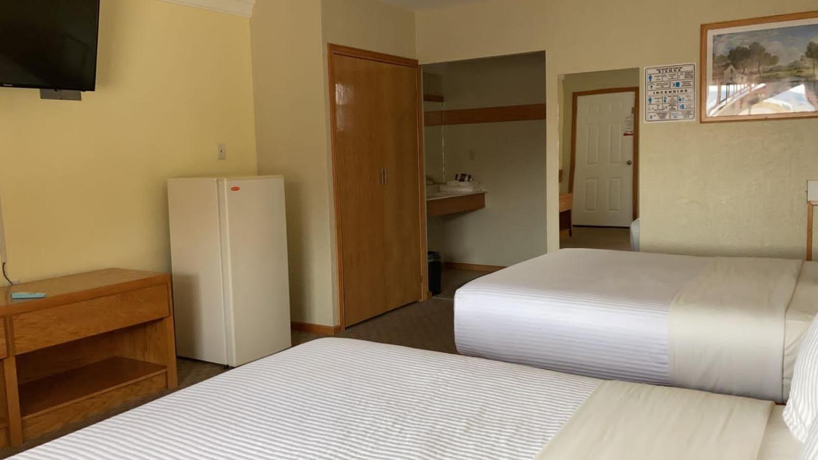 La Huerta Inn & Suites Cuauhtémoc Chambre photo